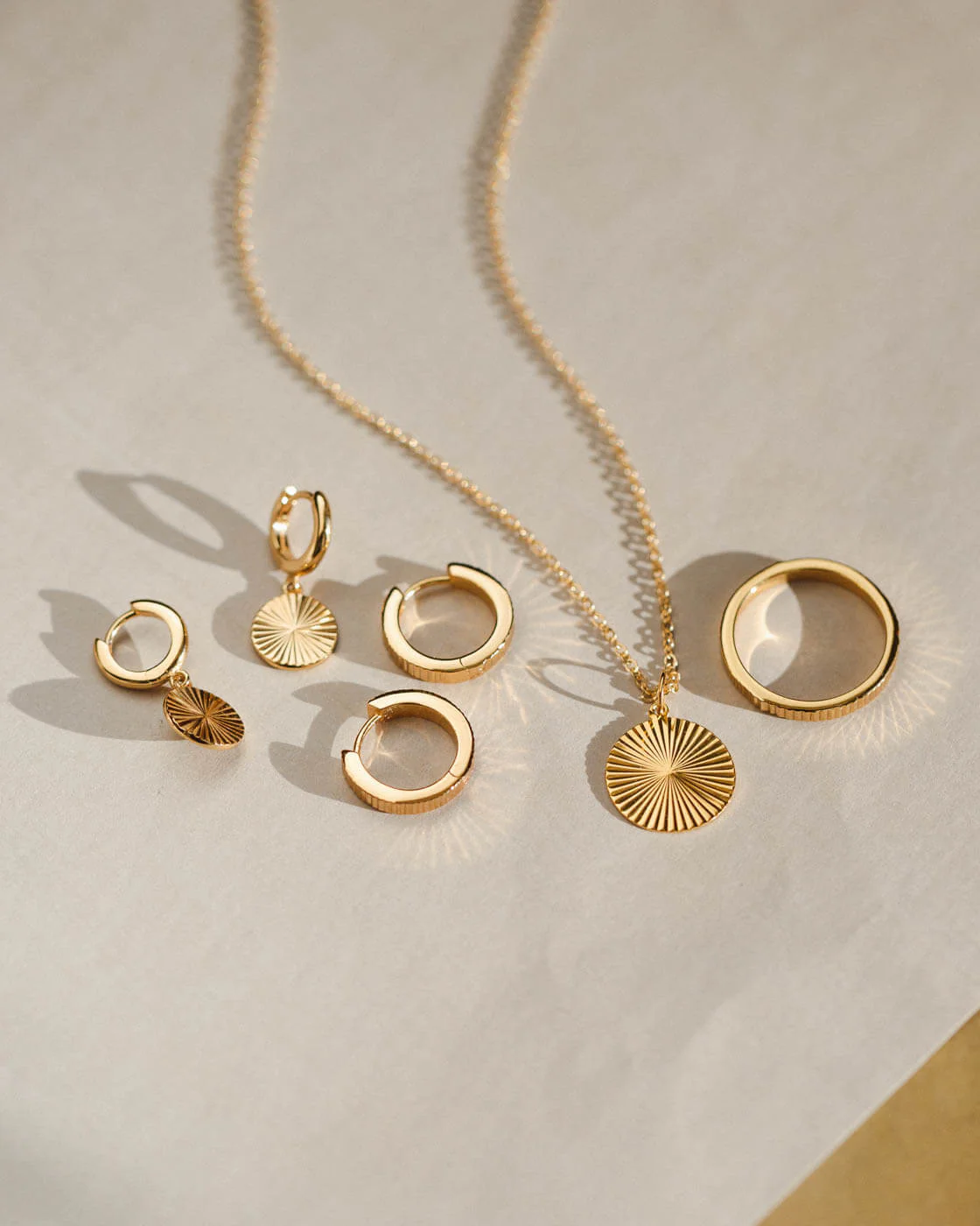 Radiant Charm Huggie Hoops - Image 3